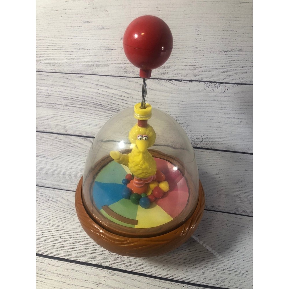 Vintage Big Bird Sesame Street spinning top toy illco toys